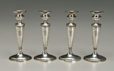 Appraisal: Set of four sterling candlesticks oval urn form pedestal bases