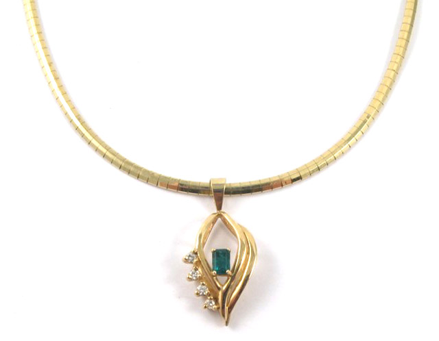 Appraisal: EMERALD AND DIAMOND PENDANT NECKLACE the pendant suspended on a