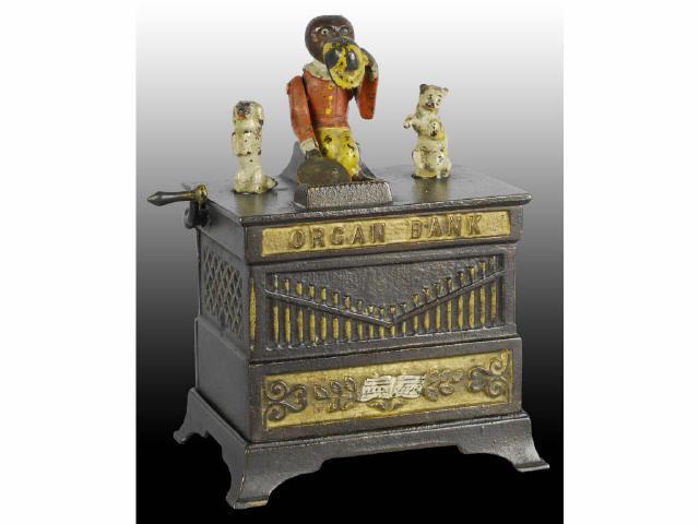 Appraisal: Cast Iron Organ Mechanical Bank Description Dancing dog and cat