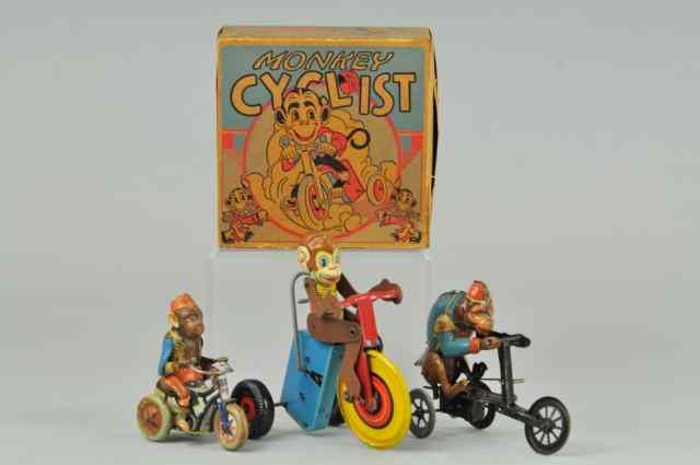 Appraisal: GROUPING OF MONKEY CYCLIST TOYS Lithographed tin lot features monkeys