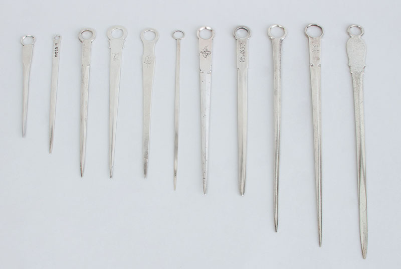 Appraisal: GROUP OF NINE SILVER SKEWERS Comprising Two crested Irish Dublin