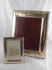 Appraisal: Two silver plated photo frame with strut backs x cm