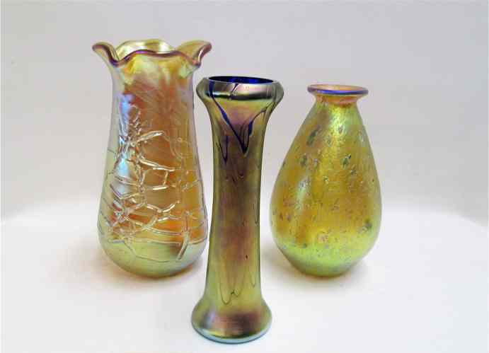 Appraisal: THREE IRIDESCENT ART GLASS VASES cobalt blue with gold iridescent