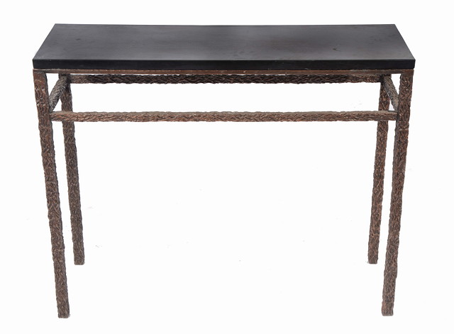 Appraisal: A modernist bronze pier side table with textured effect and