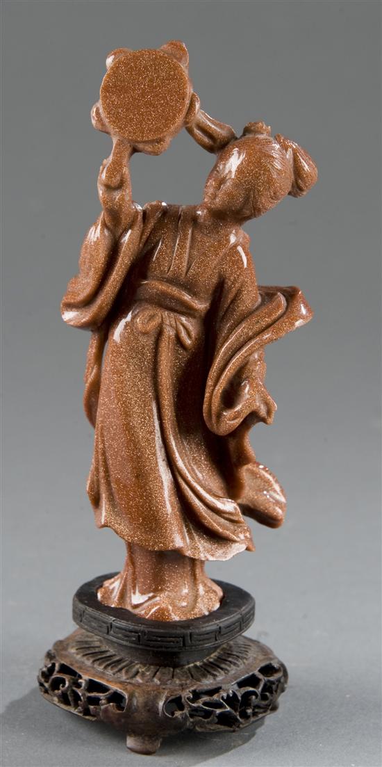 Appraisal: Chinese goldstone carving of a goddess Copper red and flecked