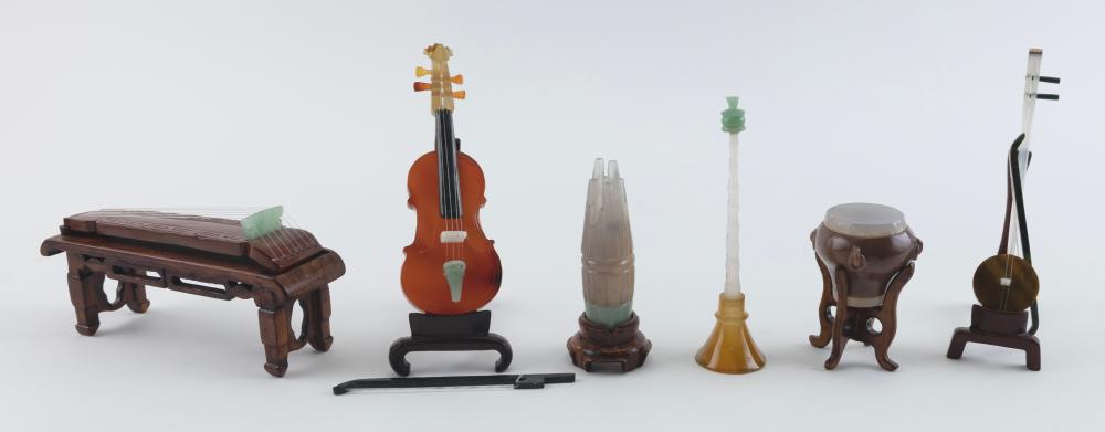 Appraisal: SEVEN CHINESE MINIATURE CARVED HARDSTONE MUSICAL INSTRUMENTS TH CENTURY HEIGHTS