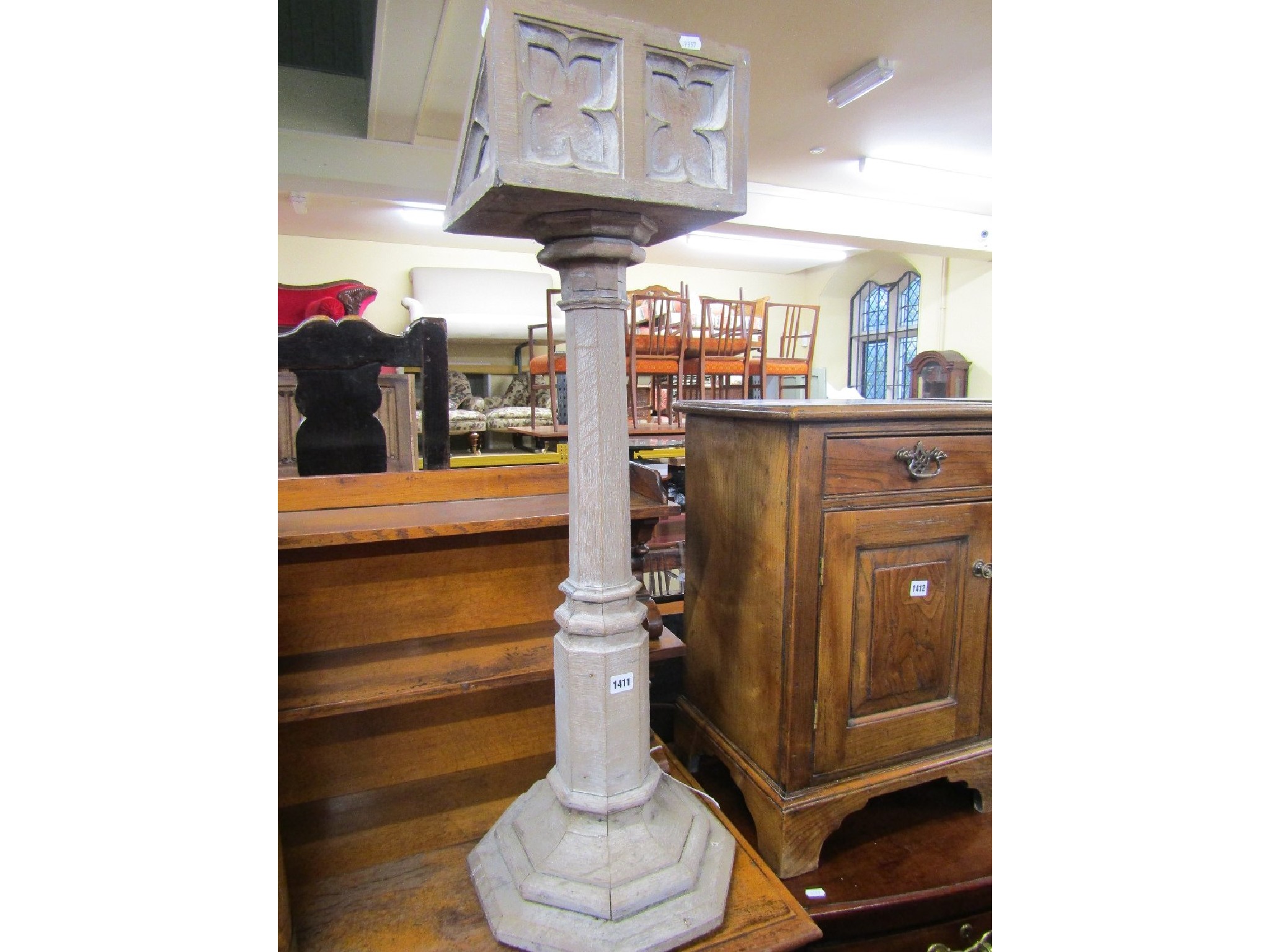 Appraisal: A Victorian fumed oak lectern in the Gothic manner raised