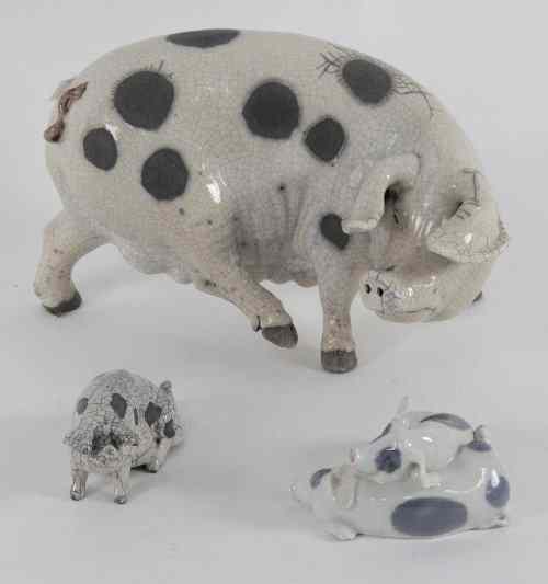 Appraisal: A Royal Copenhagen group of two pigs cm wide a