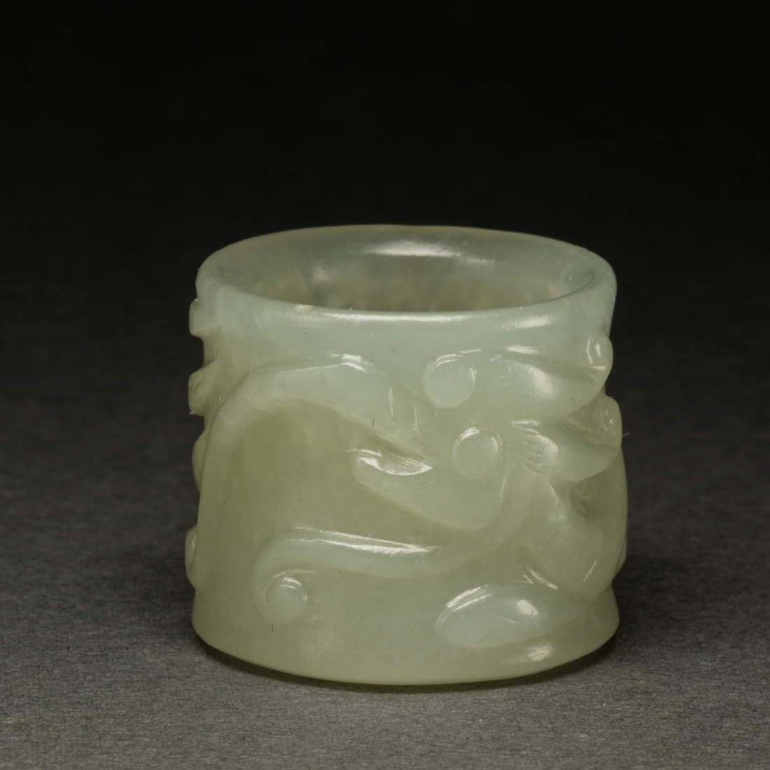 Appraisal: CHINESE WHITE JADE ARCHER'S RING Chinese white jade archer's ring