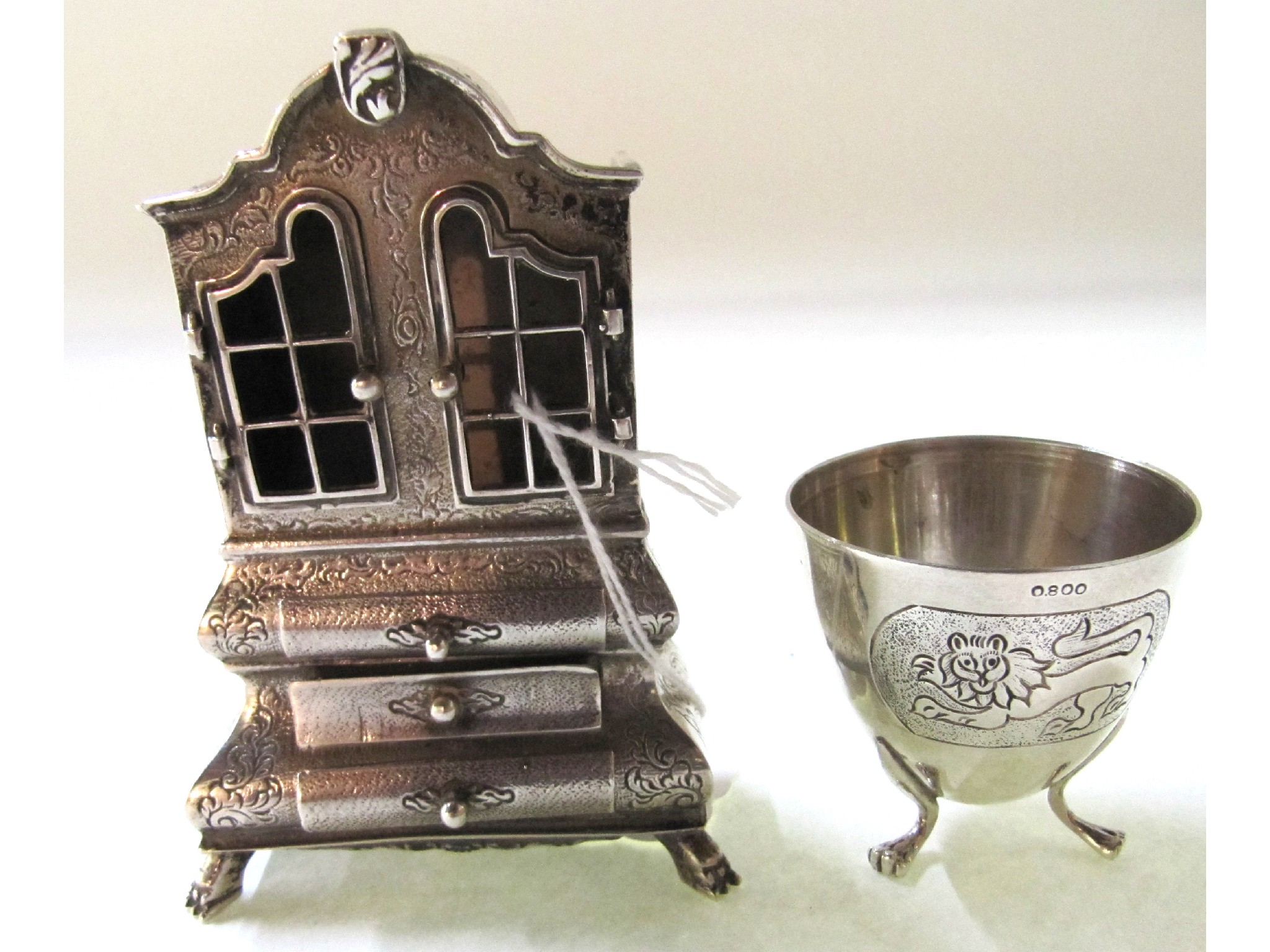 Appraisal: A lot comprising a continental silver trinket box modelled as