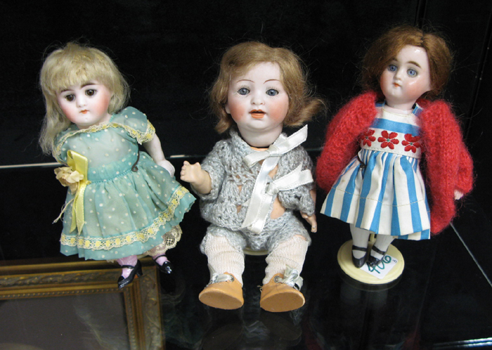 Appraisal: A GROUP OF GERMAN BISQUE DOLLS Two are all bisque