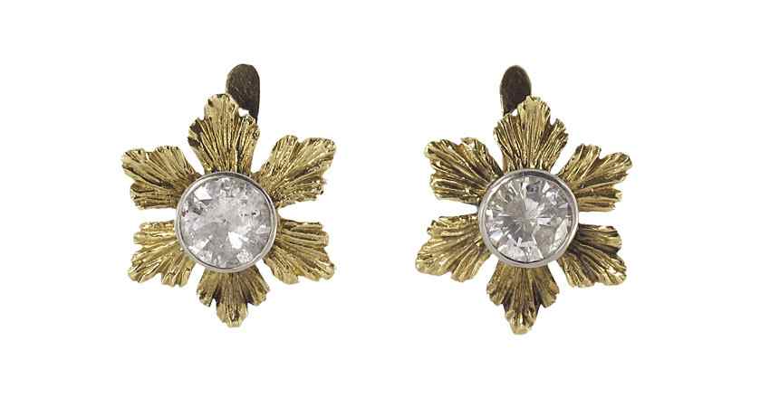 Appraisal: CT DIAMOND EARRINGS K yellow gold flower form earrings with