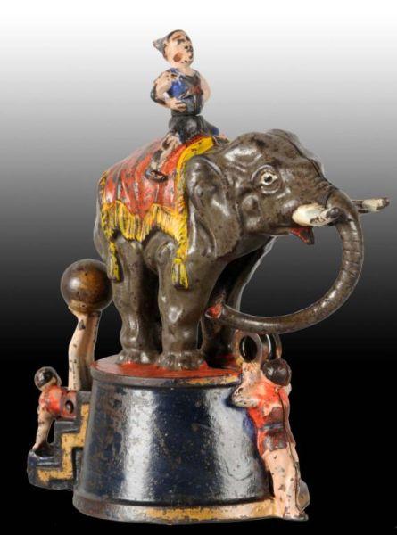 Appraisal: Cast Iron Elephant Three Clowns Mechanical Bank Description Manufactured by