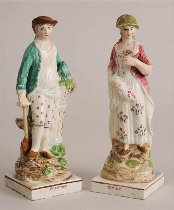 Appraisal: PAIR OF STAFFORDSHIRE PEARLWARE FIGURES GARDENER AND MATE Modeled as