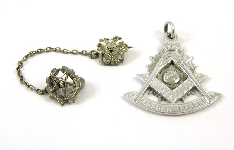 Appraisal: TWO ARTICLES OF MASONIC WHITE GOLD JEWELRY including a k