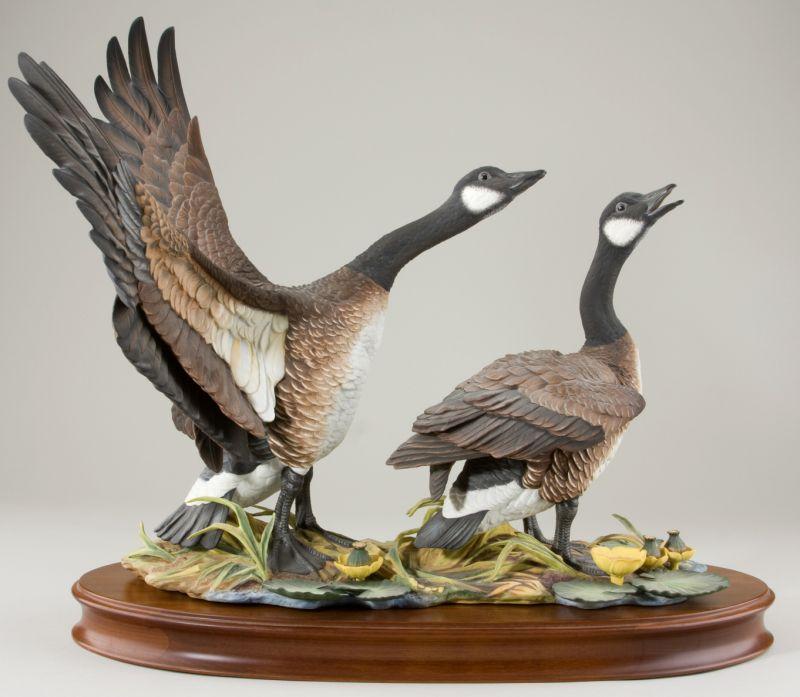 Appraisal: Hutschenreuther Bisque Figural Heading South two Canadian Geese standing in