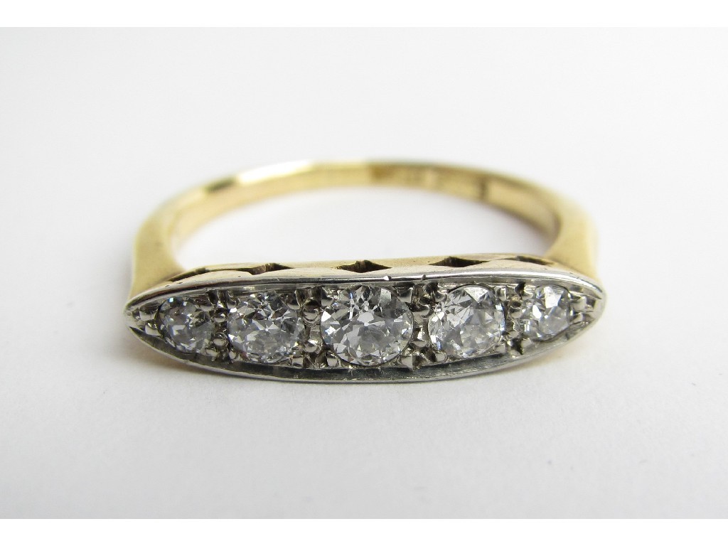 Appraisal: Edwardian ct gold and platinum diamond five stone ring with