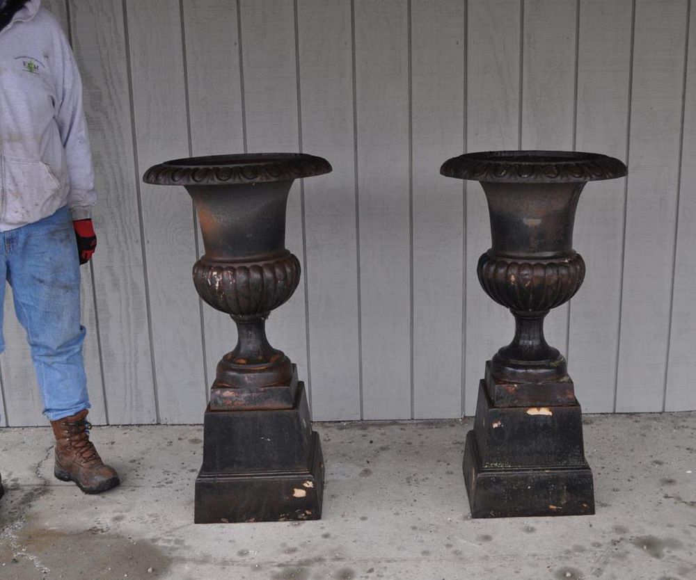 Appraisal: Pair Large Classical Cast Iron Urns on square bases each