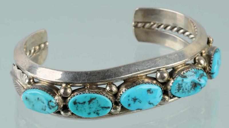 Appraisal: Native American Indian Heavy Silver Bracelet Description With five turquoise