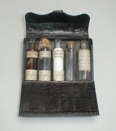 Appraisal: A thC Apothecary's leather bound envelope case containing four small