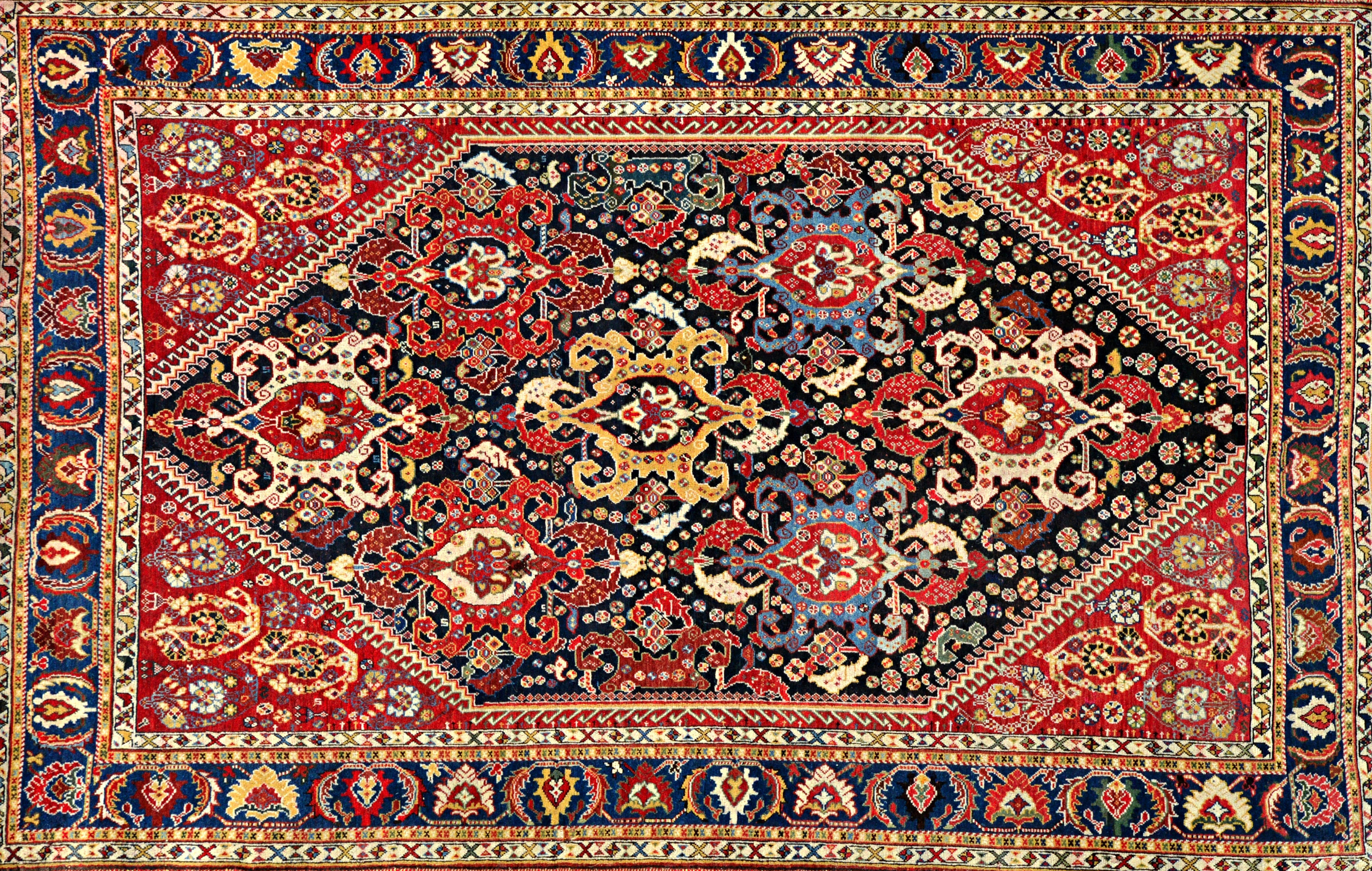 Appraisal: A Ghasghai rug South Persian the indigo field with seven