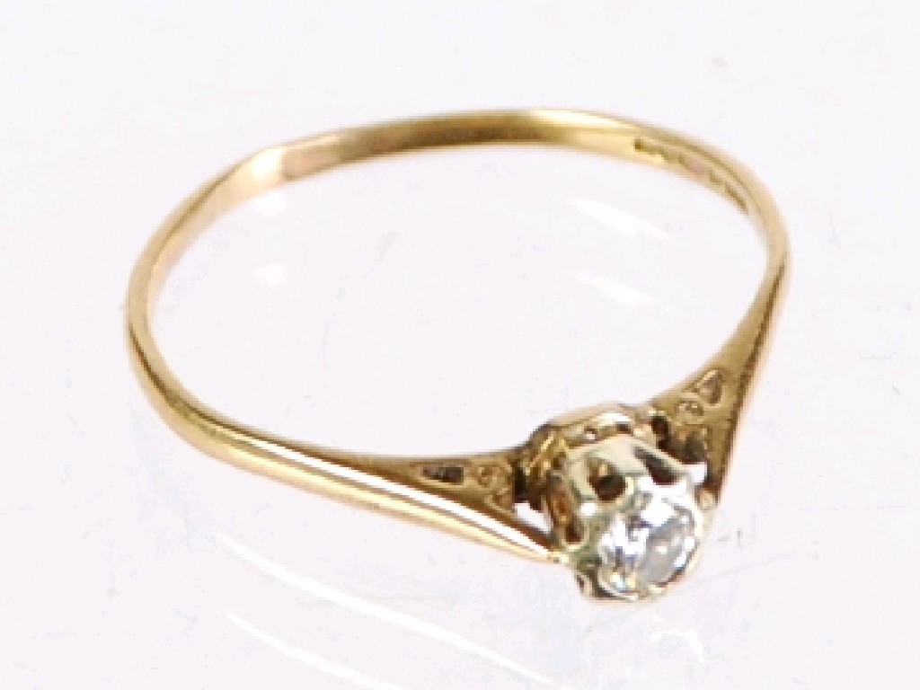 Appraisal: ct GOLD RING WITH A SOLITAIRE DIAMOND in a rubbed