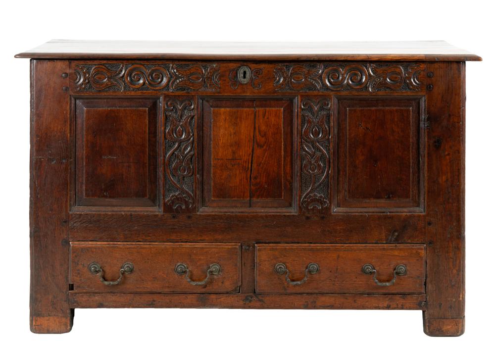 Appraisal: GEORGIAN CARVED OAK MULE CHEST th century the rectangular hinged