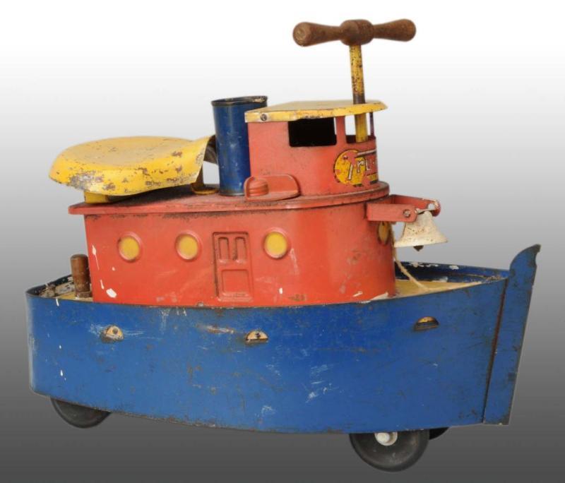 Appraisal: Pressed Steel Sit 'N Ride Tug Boat Toy Description Manufactured