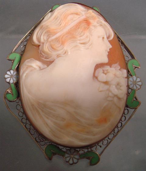 Appraisal: K WG carved shell cameo pin green white enameled decoration