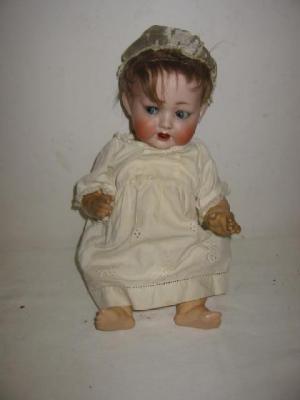 Appraisal: A Key Hahn bisque head character doll with blue lashed