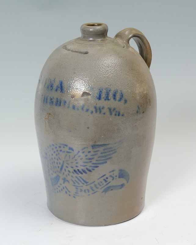 Appraisal: A P DONAGGHO BLUE DECORATED STONEWARE JUG Stencil eagle over