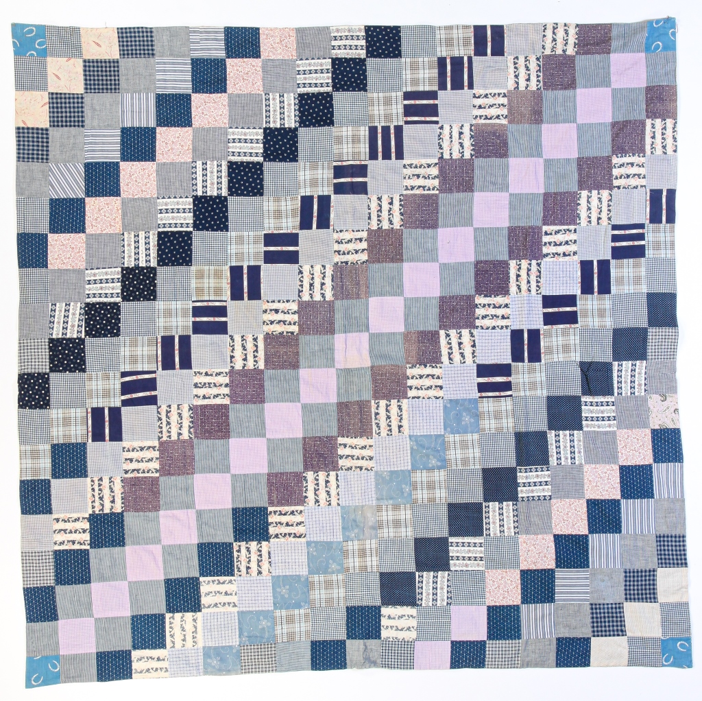 Appraisal: AMERICAN DOUBLE-SIDED QUILT Second quarter th century Multi-colored patterned fabric