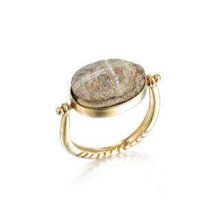 Appraisal: An Egyptian Scarab Ring Featuring a scarab bezel-set in a