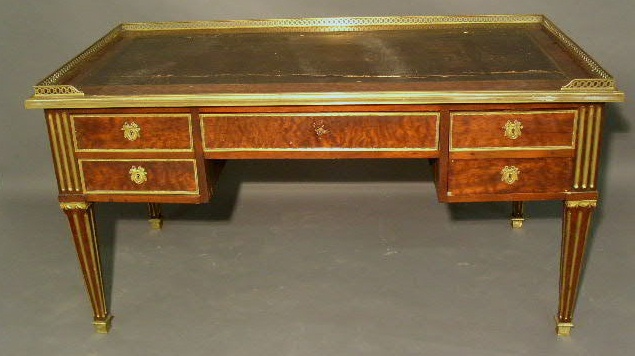 Appraisal: French walnut desk c with brass mounts and leather top