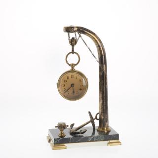 Appraisal: French nautical brass desk clock and stand French nautical brass