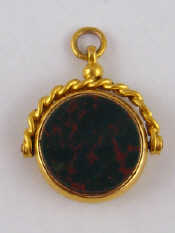 Appraisal: A carat gold swivel seal set with bloodstone and cornelian