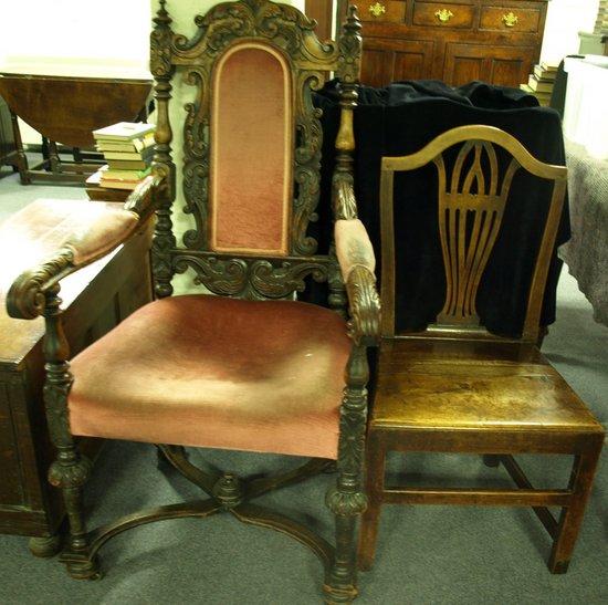 Appraisal: A Carolean style oak chair the carved crest above an