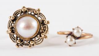 Appraisal: K Mabe pearl cocktail ring adorned with scroll rope work