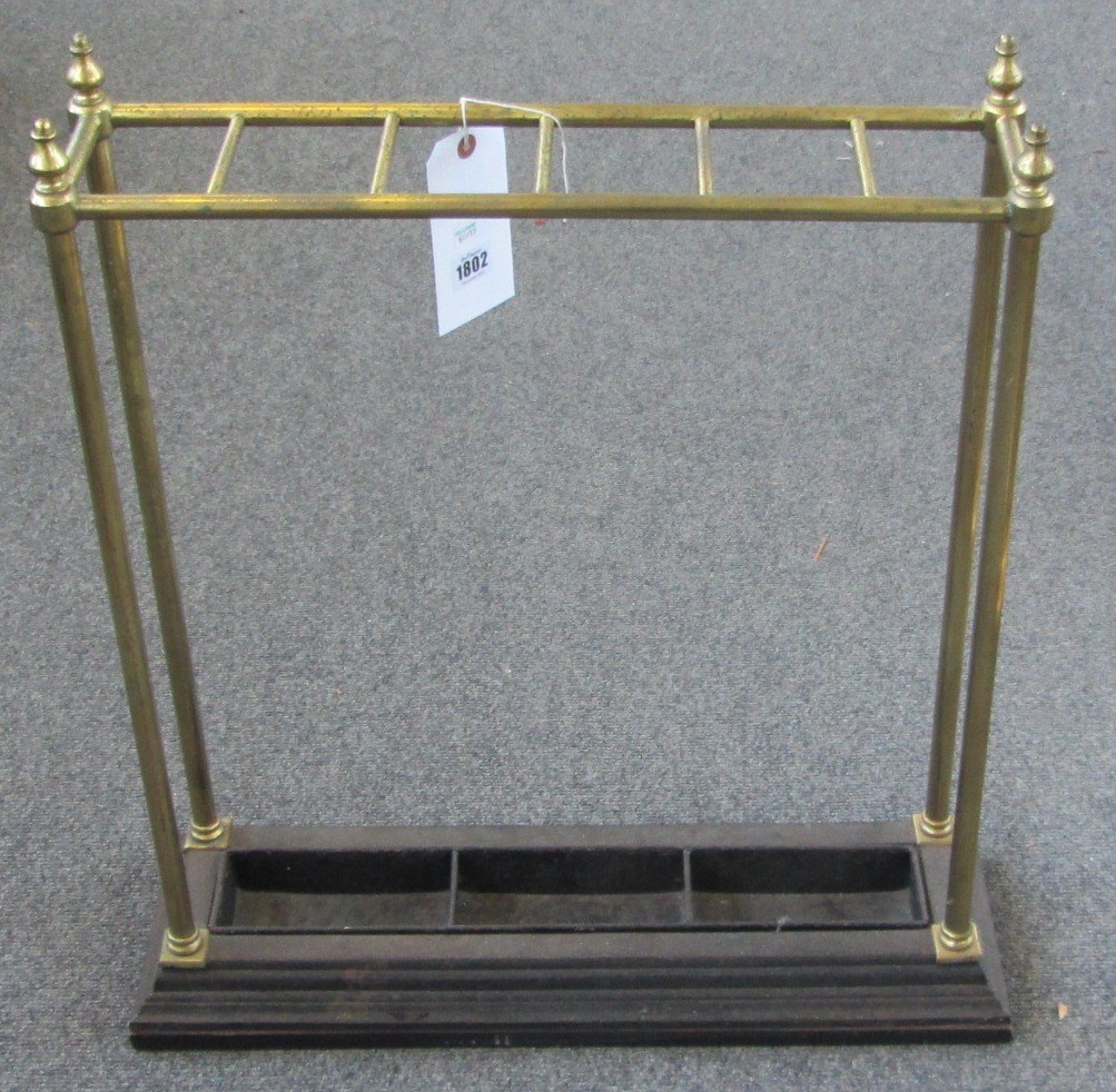 Appraisal: A Victorian brass and cast iron six division with plinth