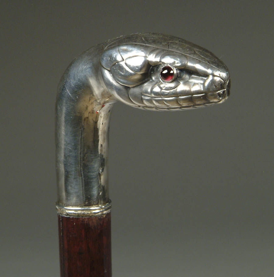 Appraisal: SILVER SNAKE HEAD CANE L-shaped snake head is marked and