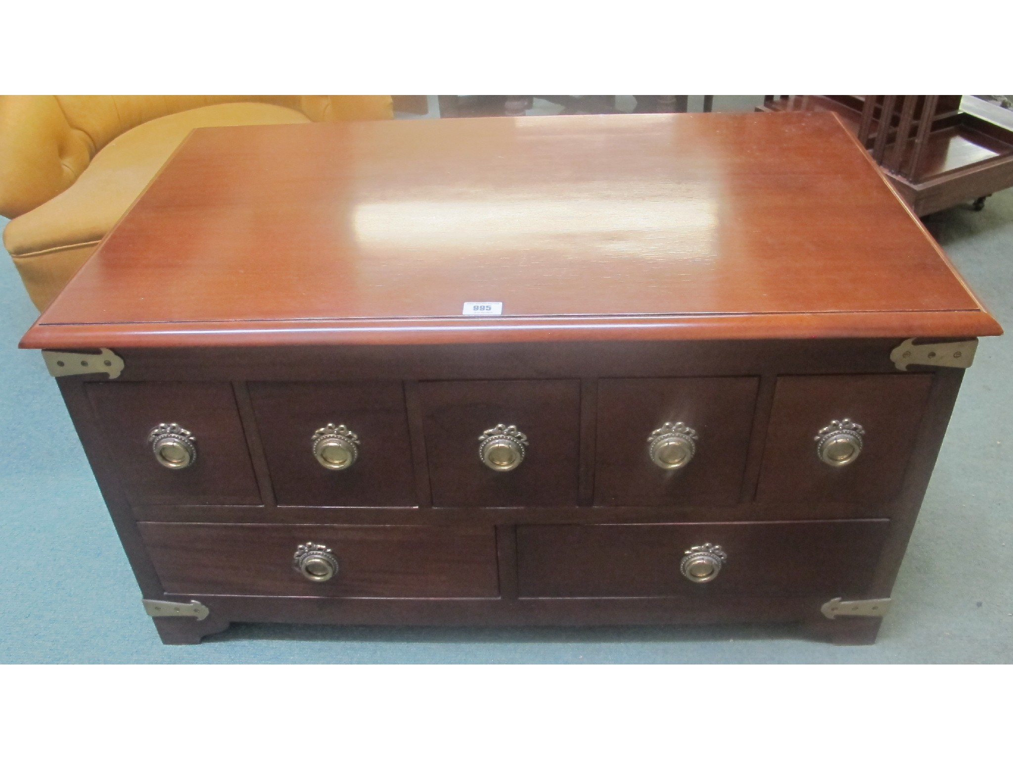 Appraisal: A modern coffee table with brass furniture