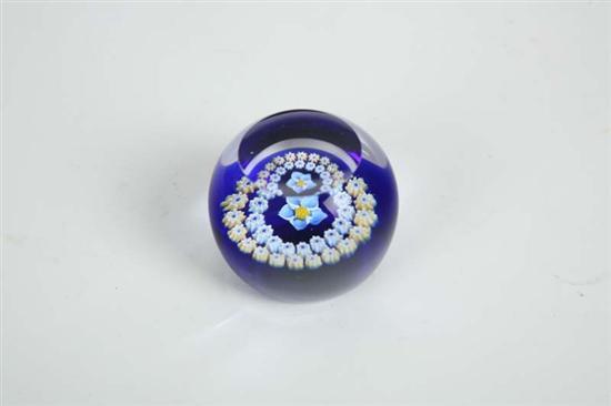 Appraisal: CAITHNESS PAPERWEIGHT A central flower with two rings of yellow