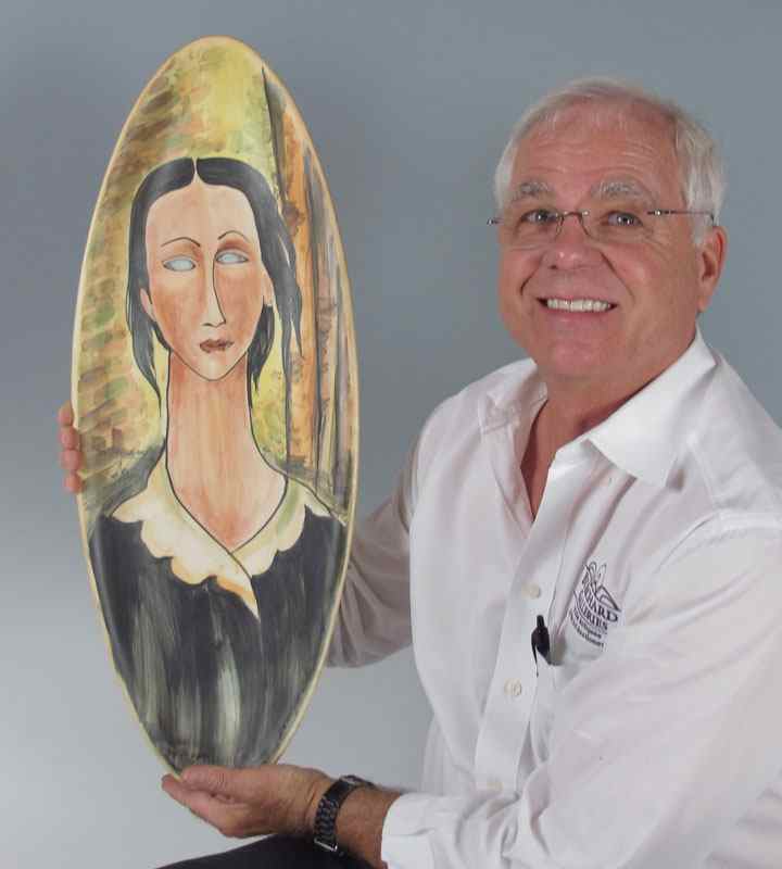 Appraisal: HAND PAINTED PORTRAIT ON OVAL PORCELAIN PLATTER AFTER MODIGLIANI Large