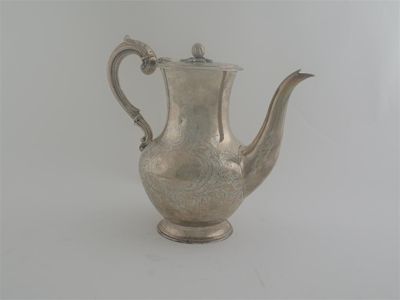 Appraisal: A Victorian coffee pot baluster form with decorative engraving scroll