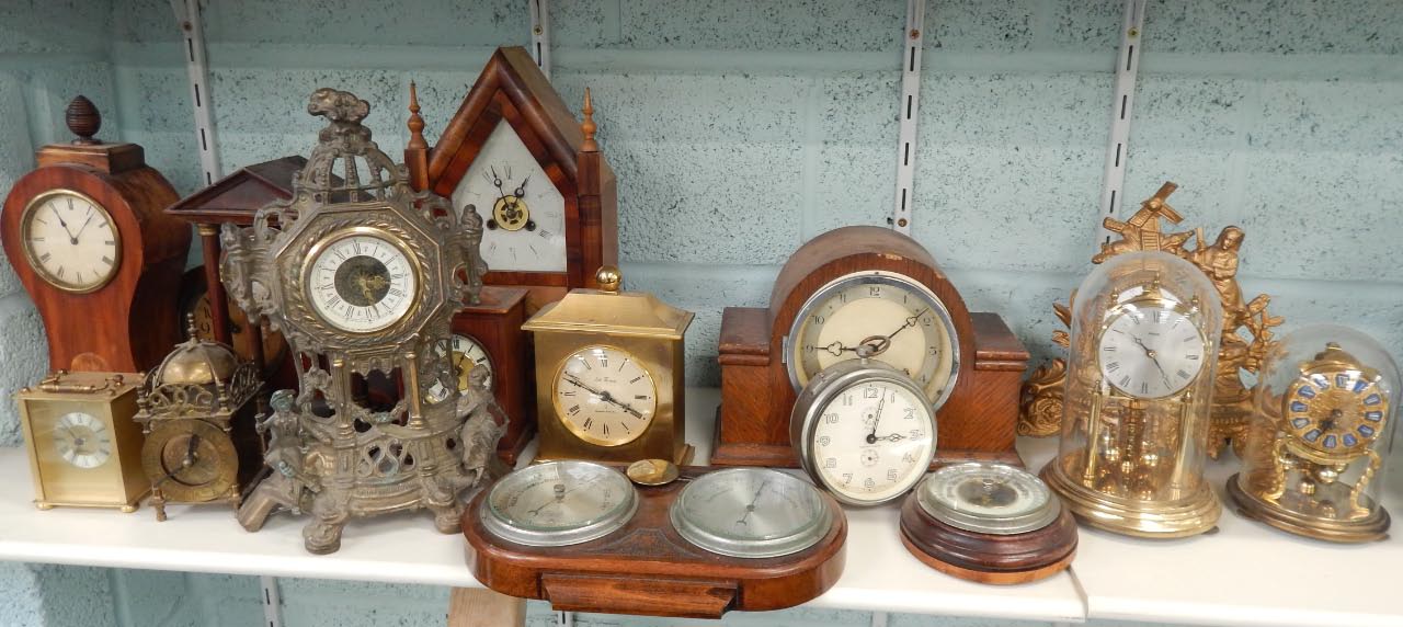 Appraisal: A collection of mantel clocks barometers etc to include an