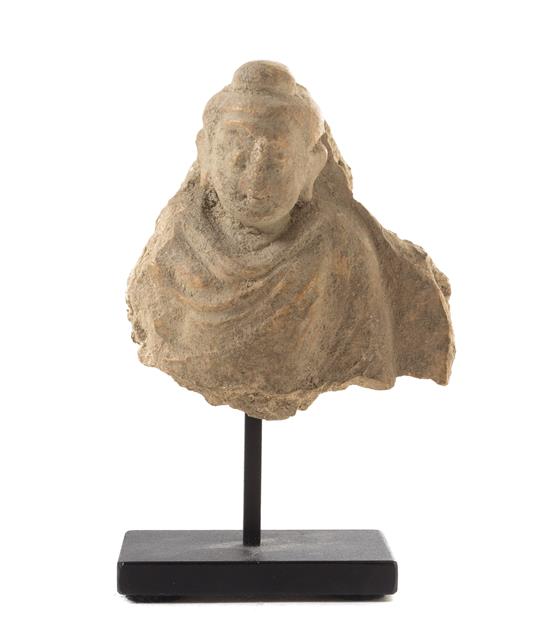 Appraisal: Sale Lot A Small Gandharan Stucco Fragment carved to show