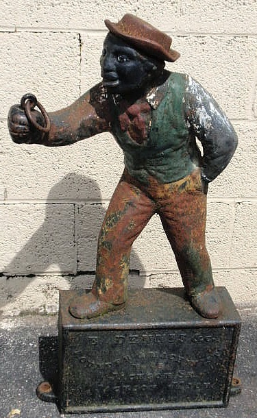 Appraisal: Cast iron stable boy jockey stamped E Dennis Co Founders