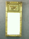 Appraisal: MIRROR - Circa carved and gilded wall mirror split column