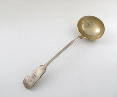 Appraisal: A Victorian silver Fiddle pattern soup ladle the terminal engraved