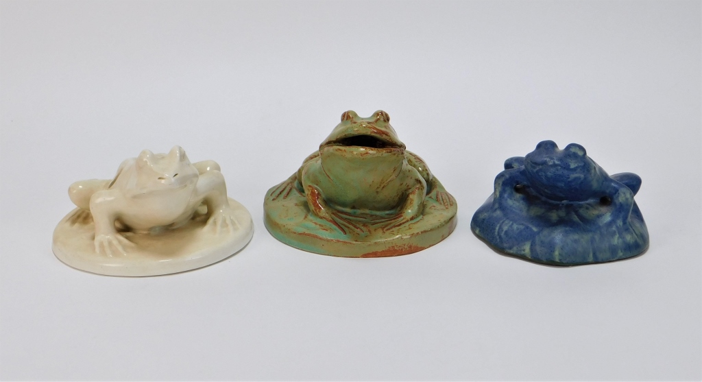 Appraisal: PC AMERICAN FIGURAL ART POTTERY FLOWER FROG GROUP United States